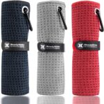 Three Handy Picks 16x16 inch microfiber golf towels in black, grey, and red, with attached carabiner clips, neatly folded.