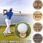 A close-up of a brown Jowxsx funny golf ball marker with a humorous phrase.