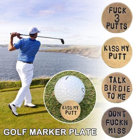 A close-up of a brown Jowxsx funny golf ball marker with a humorous phrase.